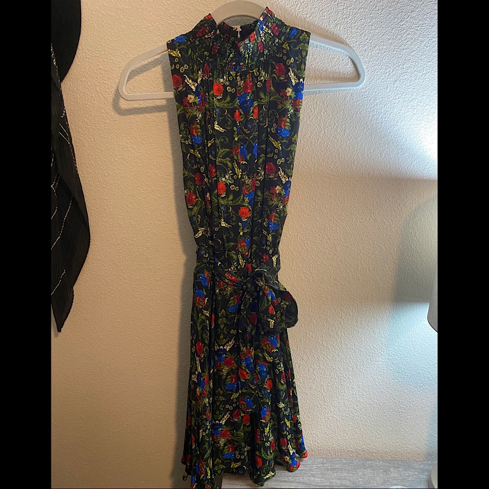 Beautiful Alice and Olivia knee length dress black with floral print never worn